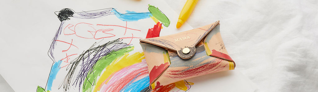 Leather purse printed with a child's drawings