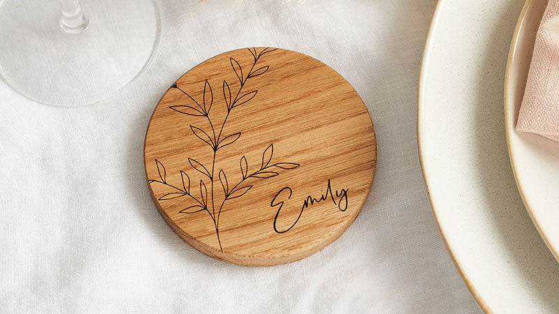 Wooden coaster engraved 'Emily'