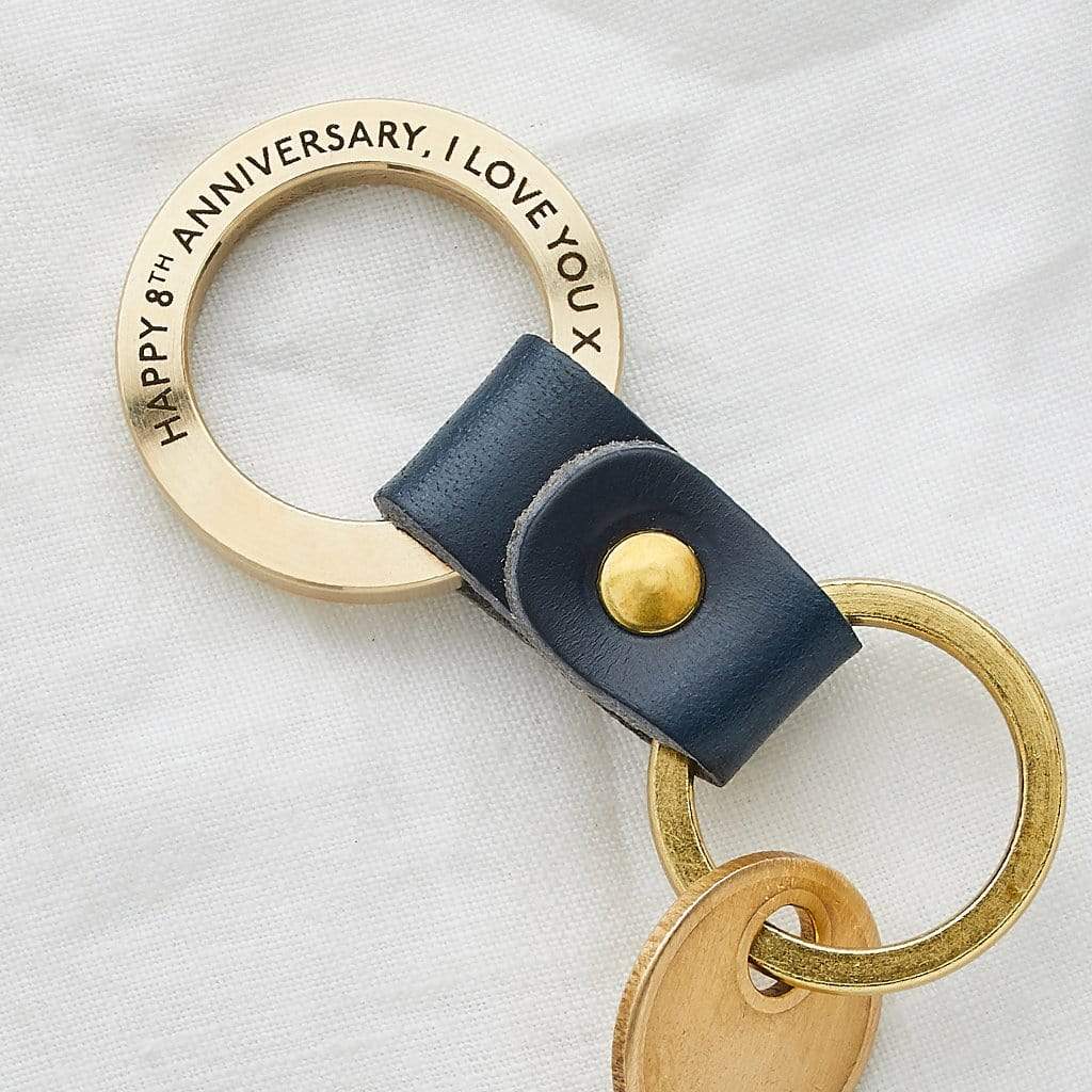 Bronze ring engraved 'Happy 8th anniversary, I love you x' on a leather strap with keyring attachment