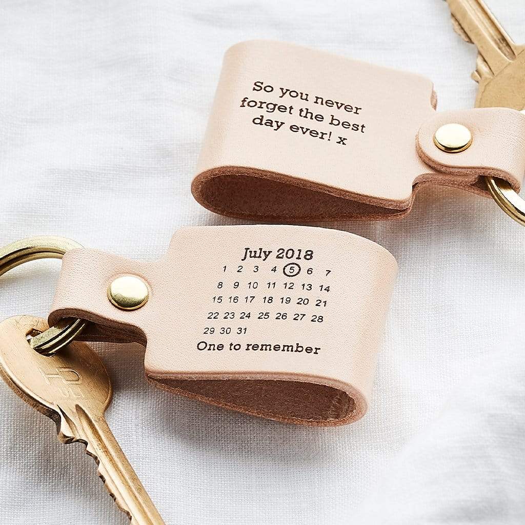 Leather keyrings engraved with calendar design and personalised messages