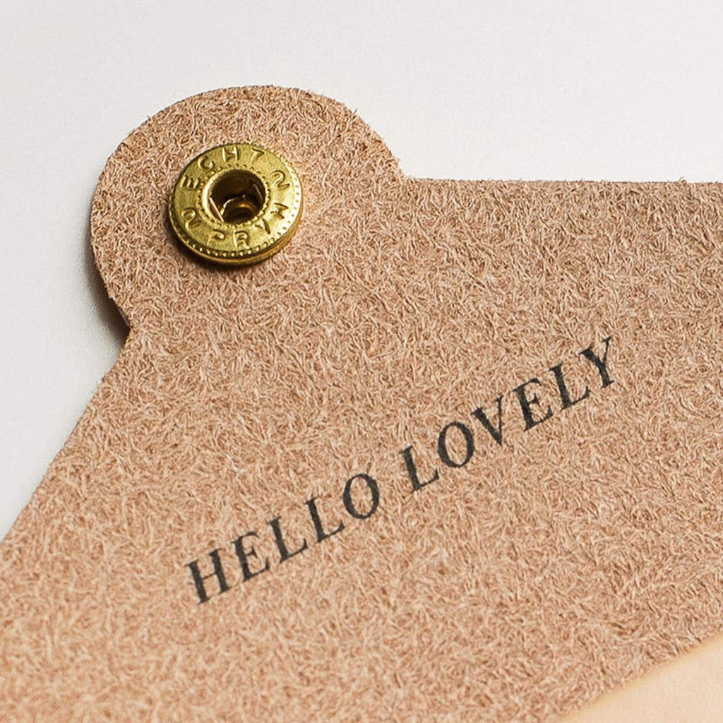'HELLO LOVELY' printed onto leather