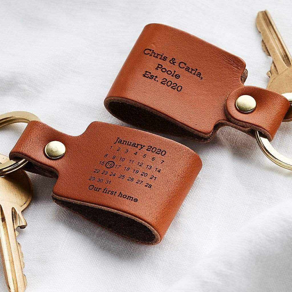 Leather keyrings engraved with calendar design and personalised messages