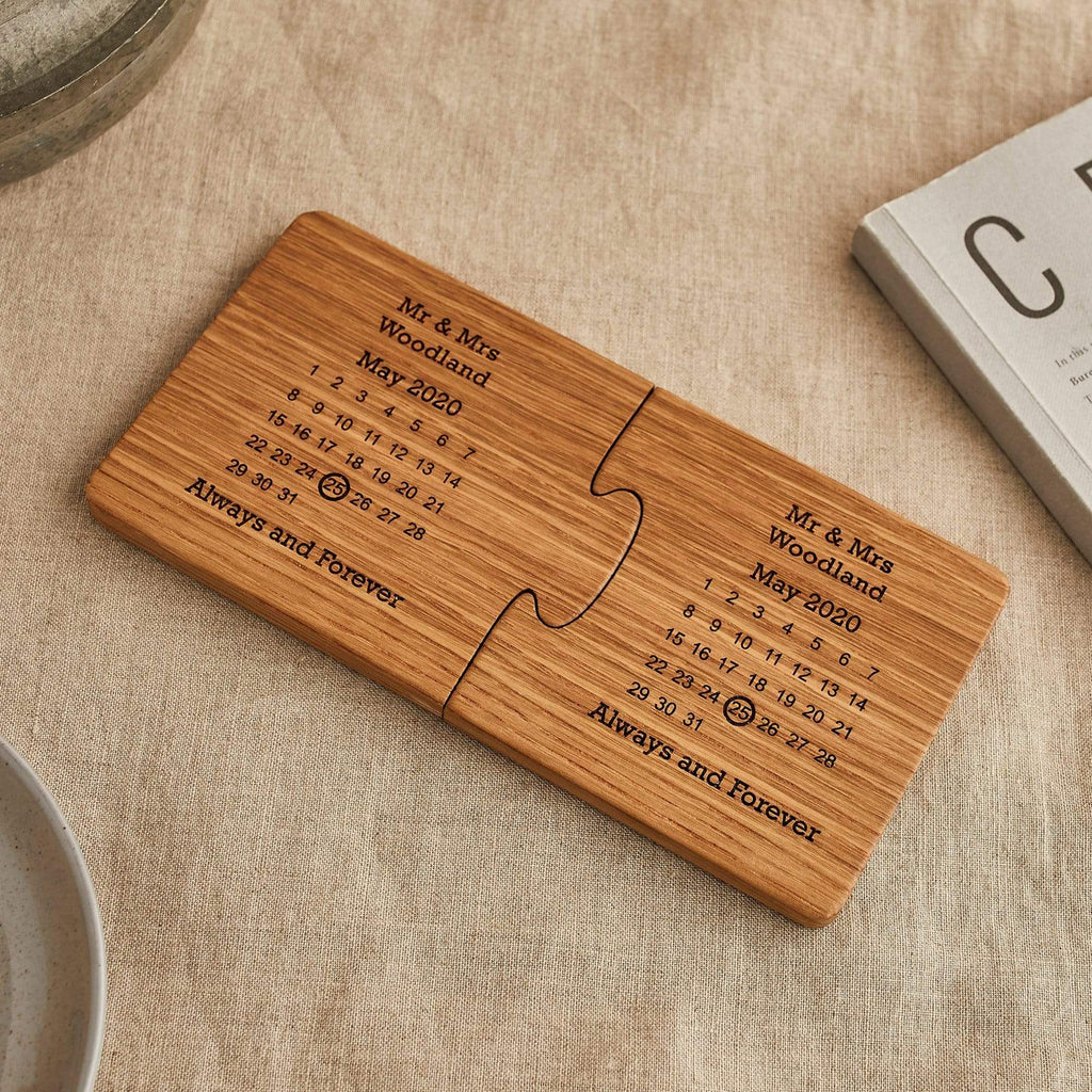 Pair of wooden coasters engraved with calendar design