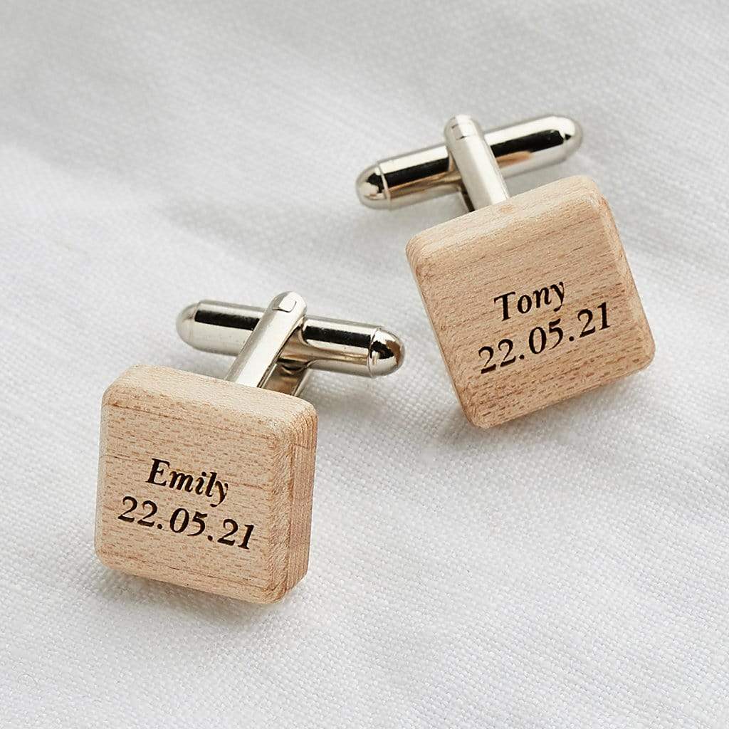 Pair of wooden cufflinks engraved with names and dates