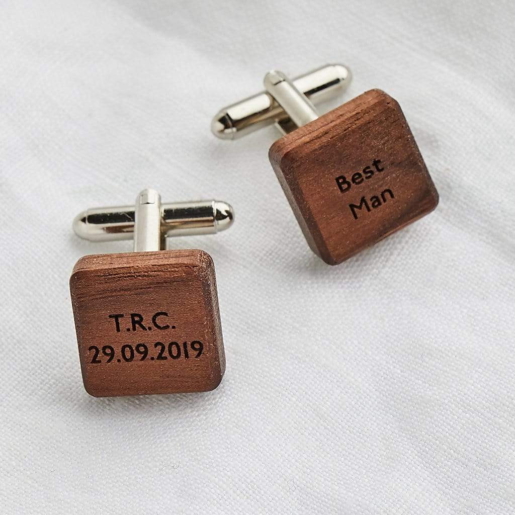 Pair of wooden cufflinks engraved with names and dates